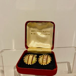 A wonderful pair of Retro Gold Plated cufflinks in a vintage jewellery box.