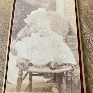 Rare Victorian CDV photograph. Original Antique Photo of a baby with a hidden mother behind a chair. Carte De Visite of child