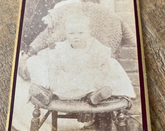 Rare Antique British CDV photograph. Original Victorian Photo of a baby with a hidden mother behind a chair. Carte De Visite of child