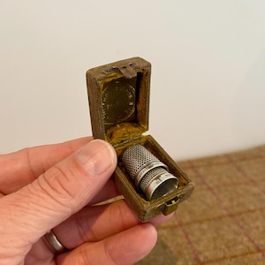 Two Antique Sterling Silver Thimbles in a wonderful vintage thimble box. No holes