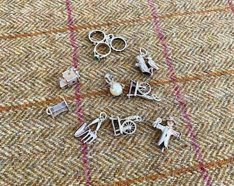 Nine Vintage Solid Silver Bracelet Charms or pendants. Vintage silver jewelry for collection or resale