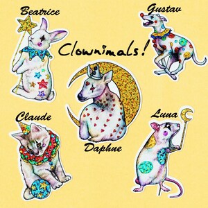 May include: Five colorful stickers featuring animal illustrations with clown-like costumes and names. The stickers feature a rabbit, a dog, a deer, a cat, and a rat. The text "Clownimals!" is written in black cursive.