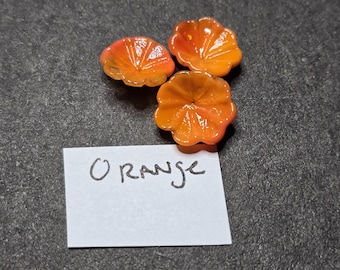 Paquete de 10 flores de color naranja con fusible COE 90