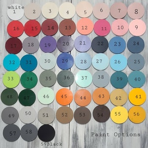 May include: A color chart with 59 paint colors, numbered 1 through 59. The colors are arranged in rows and columns. The colors include white, black, red, orange, yellow, green, blue, purple, and brown. The chart is labeled "Paint Options".