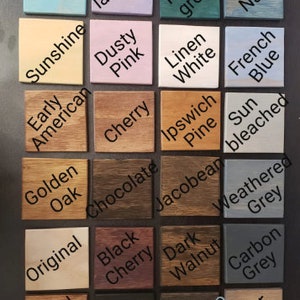 May include: A chart of 20 different wood stain colors, including Aqua, Sunshine, Lavender, Early American, Dusty Pink, Forest Green, Worn Navy, Linen White, French Blue, Cherry, Ipswich Pine, Sun Bleached, Golden Oak, Chocolate, Jacobean, Weathered Grey, Original, Black Cherry, Dark Walnut, Carbon Grey, Special Walnut, Ebony, Espresso, and Briar Smoke.