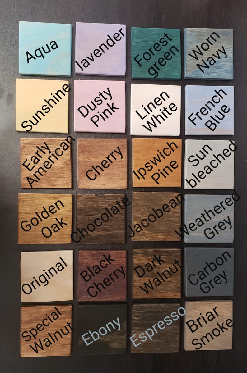 May include: A color chart of 20 different wood stains, including Aqua, Sunshine, Lavender, Dusty Pink, Cherry, Early American, Golden Oak, Original, Black Cherry, Special Walnut, Ebony, Chocolate, Forest Green, Linen White, Ipswich Pine, Sun Bleached, Jacobean, Weathered Grey, Dark Walnut, Carbon Grey, Espresso, and Briar Smoke.