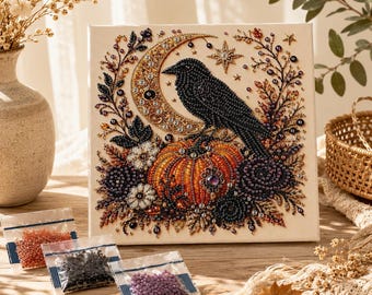 May include: A square diamond painting kit featuring a black crow perched on an orange pumpkin, set against a crescent moon and floral accents. The canvas displays numbered sections for bead placement, accompanied by three small bags of colorful beads.