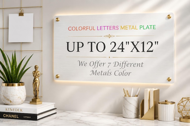 May include: A rectangular metal plate with a brushed silver finish, mounted with four gold-toned standoffs. The text reads: COLORFUL LETTERS METAL PLATE, UP TO 24"X12", and We Offer 7 Different Metals Color, featuring a decorative gold line element.
