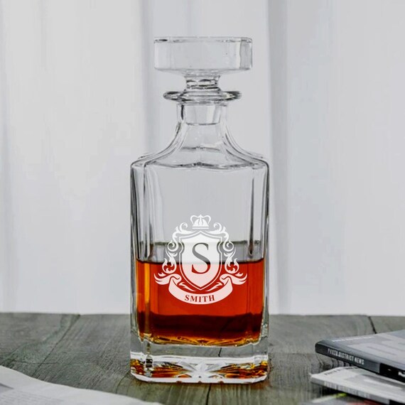 Hand-engraved whiskey decanter at a premium price point — at $195 it signals genuine craft, and decanters are a proven groomsmen/bar-cart gift that photographs beautifully.