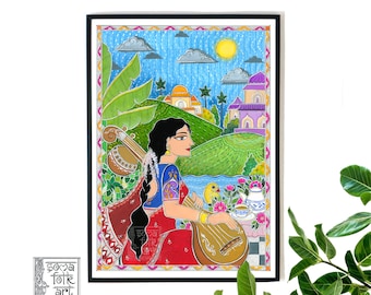 May include: A colorful painting of a woman playing a sitar in a lush green landscape. The woman is wearing a red and blue sari and has long black hair. The background features a village with buildings and a bright blue sky with clouds. The painting is framed in black.