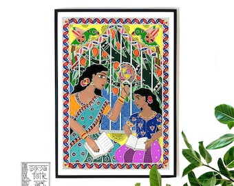 May include: A colorful painting depicting two women sitting in a window, reading books. The painting is framed in black and features a vibrant green, yellow, and blue color scheme. The women are wearing traditional Indian clothing and are surrounded by a lush green tree with yellow flowers.