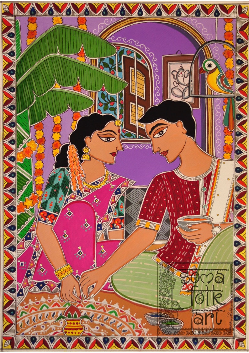 May include: A traditional Indian folk art painting depicting a couple in a colorful setting. The woman is wearing a pink sari and is drawing a rangoli design on the floor. The man is wearing a red shirt and white dhoti and is holding a cup. The painting is framed with a decorative border.