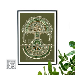 May include: A framed print of a green and brown mandala design with a tree motif. The print is on a green background and has a white border. The text "Soma Folk Art" is in the lower left corner of the print.