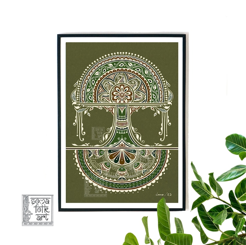 May include: A framed print of a green and brown mandala design with a tree motif. The print is on a green background and has a white border. The text "Soma Folk Art" is in the lower left corner of the print.