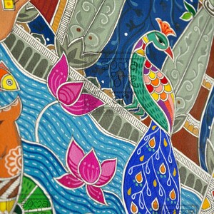 May include: A colourful folk art painting featuring a peacock with a blue tail, pink lotus flowers, and orange fish swimming in a blue river. The painting is executed in a traditional Indian style with intricate details.