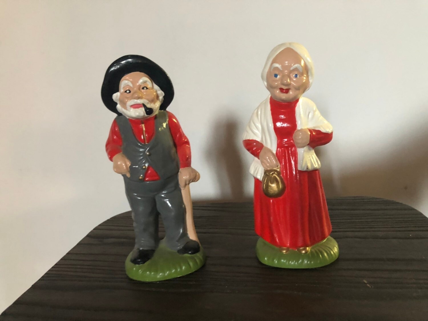 old man and woman ceramic dolls