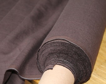 May include: A roll of dark brown fabric with a soft, fuzzy texture. The fabric is rolled up tightly and is ready to be used for sewing or crafting projects.