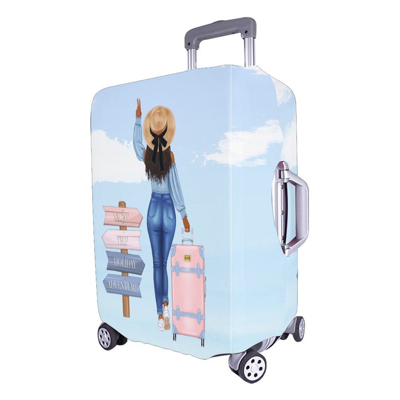 May include: A blue luggage cover with a cartoon illustration of a woman wearing a straw hat and jeans, standing in front of a signpost with the words "Moment", "Trip", "Holiday", and "Adventure".