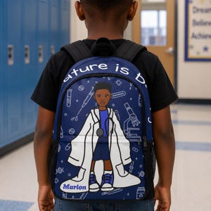 May include: A dark blue backpack featuring a cartoon illustration of a young doctor wearing a white lab coat and a stethoscope. The background pattern includes white line drawings of medical equipment. The name Marlon is printed on the coat.