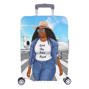 May include: A luggage cover featuring a digital illustration of a woman wearing a denim jacket, a white t-shirt with the text "Work Slay Travel Repeat", a straw hat, and sunglasses. The woman is standing on a runway in front of a private jet. The background is a blue sky with white clouds.