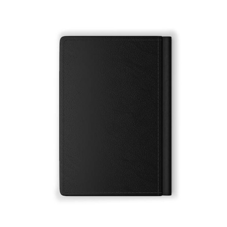May include: A black leather notebook with a stitched edge.