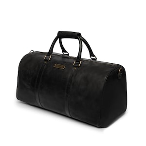 DRAKENSBERG Weekender »John« Noir, sac de voyage et sac de sport fait main pour hommes en cuir premium durable.