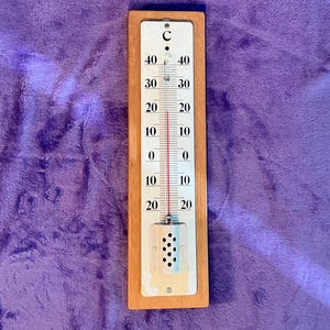 Old enamel wall thermometer circa 1950s or older, shabby chic