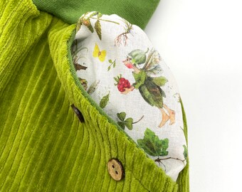 Biologische Breicord rok lichtgroen met bloemenelfzakken Groeit met je mee
