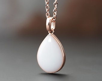 Breastmilk Jewelry | Cherish your bond with your baby with a breastmilk oval necklace keepsake the Pure One from KeepsakeMom Handmade item.