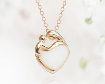Breastmilk Jewelry mother baby heart necklace gold plated sterling silver chain from KeepsakeMom. Handmade item.