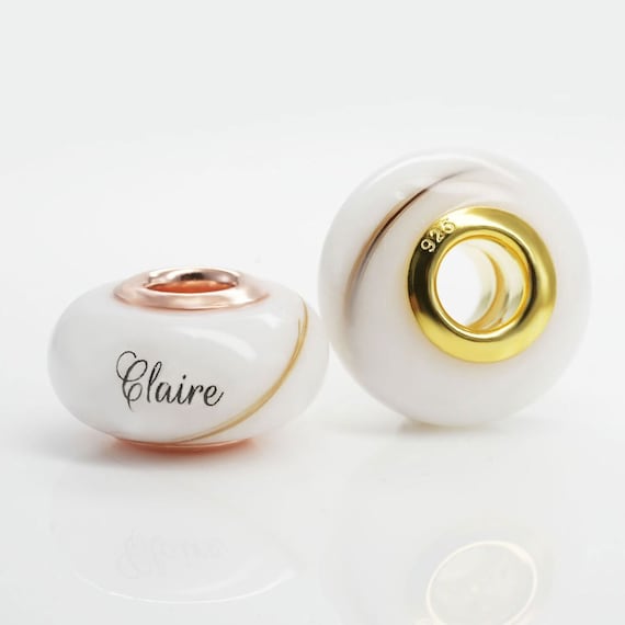 Breastmilk jewelry bead with 925 sterling silver cores, gold plated options. Pearl powder or natural. Breastmilk bead keepsake. KeepsakeMom