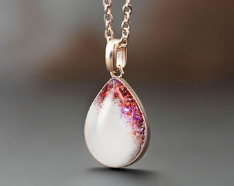 Breastmilk Jewelry teardrop drop shaped necklace with your breastmilk and colored flakes from KeepsakeMom Handmade item.