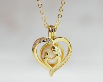 Breastmilk Jewelry mother baby heart locket/cage necklace rose gold plated sterling silver chain from KeepsakeMom. Handmade item.