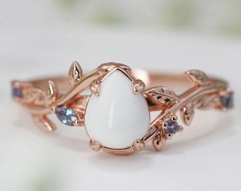Breast milk ring branch shaped with leaves and birth month color gems and drop shaped breast milk stone, sterling silver, gold plated ring.