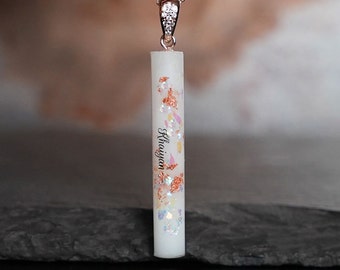 Breast milk jewelry bar with opal effect flakes and rose gold plated sterling silver bail and chain with Austrian crystals from KeepsakeMom