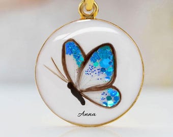 Hair Keepsake Jewelry "Butterfly" Disc necklace, pendant  baby hair and birth color flakes. KeepsakeMom. Keepsake hair butterfly necklace