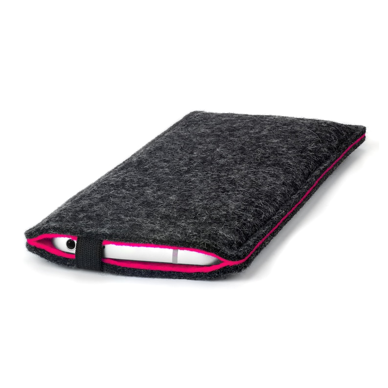 May include: A gray felt phone case with a bright pink trim. The case has a black strap.