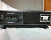 Vintage Century Mark IV Transistor Flip Clock Radio - Roll Dial Numbers Time Digital AM FM Stereo Speaker Output Solid State Wake Up Buzzer