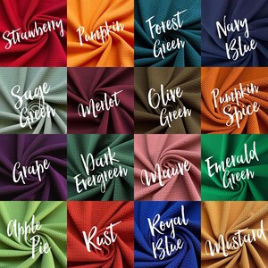 May include: A collection of 16 fabric swatches in various colors and textures, including Strawberry, Pumpkin, Forest Green, Navy Blue, Sage Green, Merlot, Olive Green, Pumpkin Spice, Grape, Dark Evergreen, Mauve, Emerald Green, Apple Pie, Rust, Royal Blue, and Mustard.