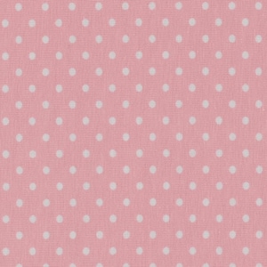 Könnte beinhalten: Rosa Stoff mit weißen Punkten.
