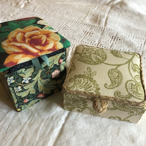 Pair of small fabric covered storage boxes