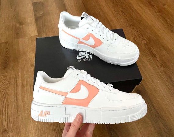 white and peach air force ones