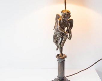 Large table lamp with Cupid bronze 20th century (86 cm)