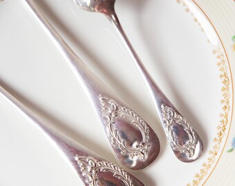 Antique French flatware set for 12 by Ravinet d’Enfert, medallion pattern (38 pieces)