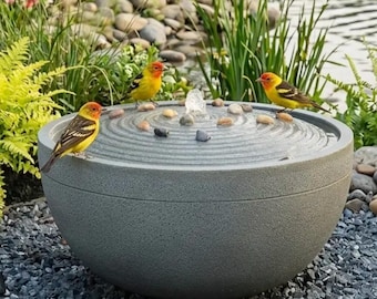Solar-powered garden fountain / Outdoor water feature with pebbles