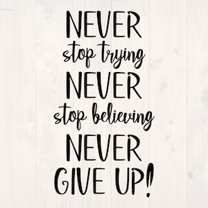 May include: Black and white typography on a white wood background. The text reads "NEVER stop trying NEVER stop believing NEVER GIVE UP!"