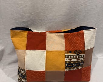 Gesteppte Beuteltasche im Westernlook