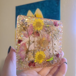 El plato de anillo de posavasos de flores de Tarot del Sol