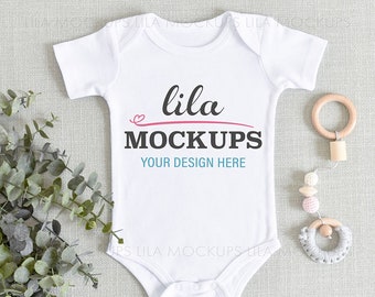 baby bodysuit Mockup PHOTO - baby bodysuit mockup / baby bodysuit MOCKUP flatlay PHOTO / blank White baby Mock-up Stock Photo