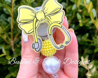 Badgehaspel gele strik, haspel glitterbadge, haspel coquette-badge, gepersonaliseerde haspel badge haspel, haspel verpleegsterbadge, haspel aangepaste badge, haspel badge haspel